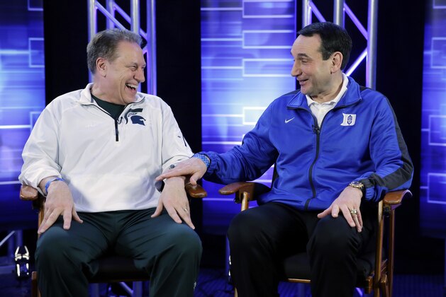 Michigan State head coach Tom Izzo and Duke head coach Mike Krzyzewski talk during a CBS Sports interview for their NCAA Final Four tournament college basketball semifinal game Thursday, April 2, 2015, in Indianapolis. (AP Photo/David J. Phillip)