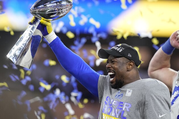 Los Angeles Rams outside linebacker Von Miller holds up the Lombardi Trophy after the Rams defeated the Cincinnati Bengals in the NFL Super Bowl 56 football game Sunday, Feb. 13, 2022, in Inglewood, Calif. (AP Photo/Lynne Sladky) Los Angeles Rams outside linebacker Von Miller holds up the Lombardi Trophy after the Rams defeated the Cincinnati Bengals in the NFL Super Bowl 56 football game Sunday, Feb. 13, 2022, in Inglewood, Calif. (AP Photo/Lynne Sladky)