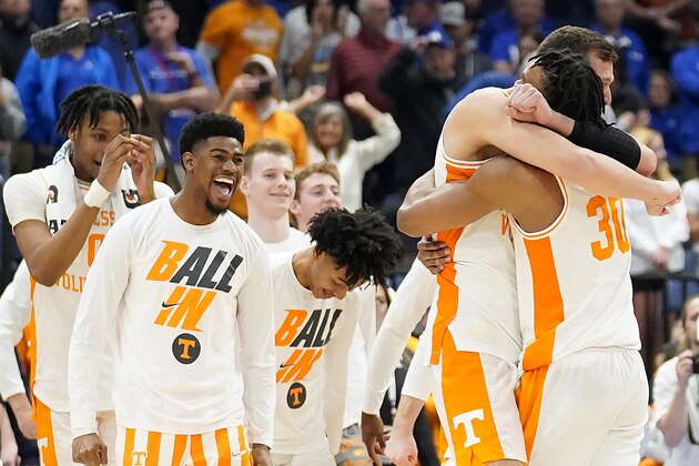 Tennessee players celebrate after defeating Kentucky in an NCAA college basketball game in the semifinal round at the Southeastern Conference tournament, Saturday, March 12, 2022, in Tampa, Fla. (AP Photo/Chris O'Meara)