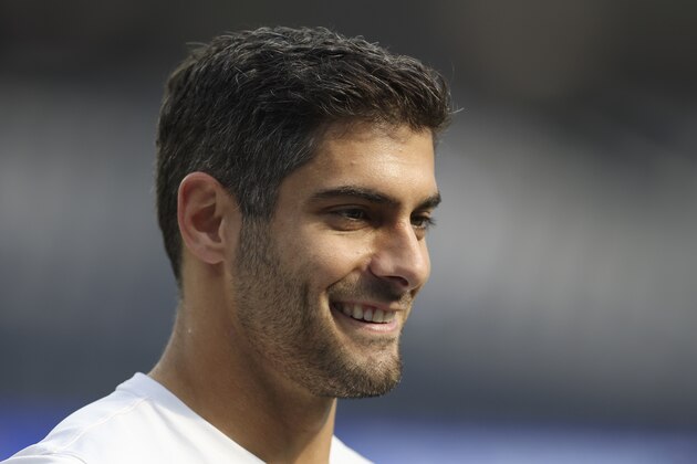 San Francisco 49ers' Jimmy Garoppolo looks over the field at SoFi Stadium before the NFC Championship NFL football game against the Los Angeles Rams Sunday, Jan. 30, 2022, in Inglewood, Calif. (AP Photo/Jed Jacobsohn)