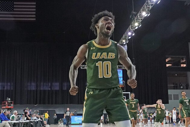 UAB guard Jordan Walker (10) reacts to hitting a basket late in the second half of an NCAA college basketball game against Middle Tennessee in the semifinal round of the Conference USA tournament in Frisco, Texas, Friday, March 11, 2022. (AP Photo/LM Otero)