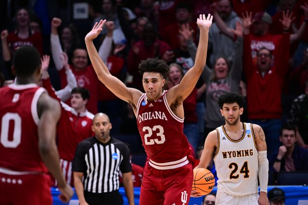 DAYTON, OH - MARCH 15: Trayce Jackson-Davis #23 of the Indiana Hoosiers celebrates his dunk against the Wyoming Cowboys during the First Four round of the 2022 NCAA Men's Basketball Tournament held at UD Arena on March 15, 2022 in Dayton, Ohio. (Photo by Ben Solomon/NCAA Photos via Getty Images )
