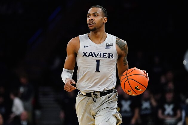 Xavier's Paul Scruggs (1) looks to pass during the first half of an NCAA basketball game against Butler at the Big East basketball tournament Wednesday, March 9, 2022, in New York. (AP Photo/Frank Franklin II)