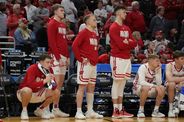 MILWAUKEE, WISCONSIN - MARCH 20: The Wisconsin Badgers bench looks on late during the second half against the Iowa State Cyclones in the second round of the 2022 NCAA Men's Basketball Tournament at Fiserv Forum on March 20, 2022 in Milwaukee, Wisconsin. Iowa State defeated Wisconsin 53-48. (Photo by Stacy Revere/Getty Images)