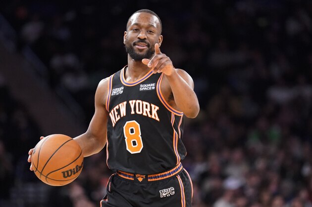 New York Knicks guard Kemba Walker (8) dribbles up the court during the second half of an NBA basketball game against the Brooklyn Nets, Wednesday, Feb. 16, 2022, in New York. (AP Photo/John Minchillo)
