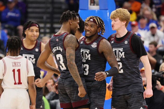 TAMPA, FLORIDA - MARCH 12: Quenton Jackson #3, Tyrece Radford #23, and Hayden Hefner #2 of the Texas A&M Aggies celebrate after a play during the second half against the Arkansas Razorbacks in the Semifinal game of the SEC Men's Basketball Tournament at Amalie Arena on March 12, 2022 in Tampa, Florida. (Photo by Andy Lyons/Getty Images) TAMPA, FLORIDA - MARCH 12: Quenton Jackson #3, Tyrece Radford #23, and Hayden Hefner #2 of the Texas A&M Aggies celebrate after a play during the second half against the Arkansas Razorbacks in the Semifinal game of the SEC Men's Basketball Tournament at Amalie Arena on March 12, 2022 in Tampa, Florida. (Photo by Andy Lyons/Getty Images)