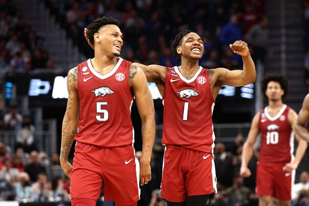 SAN FRANCISCO, CALIFORNIA - MARCH 24: Au'Diese Toney #5 and JD Notae #1 of the Arkansas Razorbacks smile during the second half against the Gonzaga Bulldogs in the Sweet Sixteen round game of the 2022 NCAA Men's Basketball Tournament at Chase Center on March 24, 2022 in San Francisco, California. (Photo by Ezra Shaw/Getty Images)