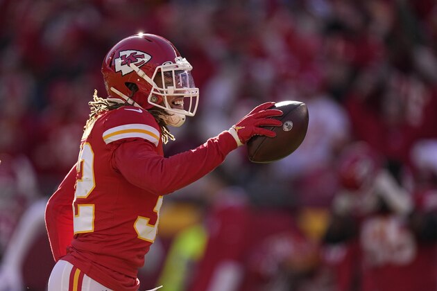 Kansas City Chiefs safety Tyrann Mathieu celebrates after recovering a fumble during the first half of an NFL football game against the Las Vegas Raiders Sunday, Dec. 12, 2021, in Kansas City, Mo. (AP Photo/Charlie Riedel)