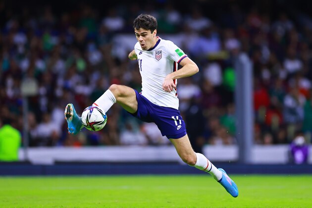 MEXICO CITY, MEXICO - MARCH 24: Giovanni Reyna of United States drives the ball during the match between Mexico and The United States as part of the Concacaf 2022 FIFA World Cup Qualifiers at Azteca Stadium on March 24, 2022 in Mexico City, Mexico. (Photo by Hector Vivas/Getty Images)