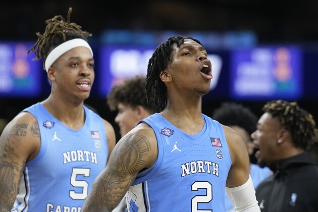 North Carolina's Caleb Love (2) celebrates after North Carolina's win against Duke in a college basketball game during the semifinal round of the Men's Final Four NCAA tournament, Saturday, April 2, 2022, in New Orleans.(AP Photo/Brynn Anderson)