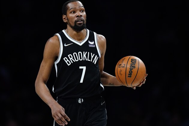 Brooklyn Nets' Kevin Durant (7) looks to pass during the second half of an NBA basketball game against the Detroit Pistons Tuesday, March 29, 2022 in New York. The Nets won 130-123. (AP Photo/Frank Franklin II)