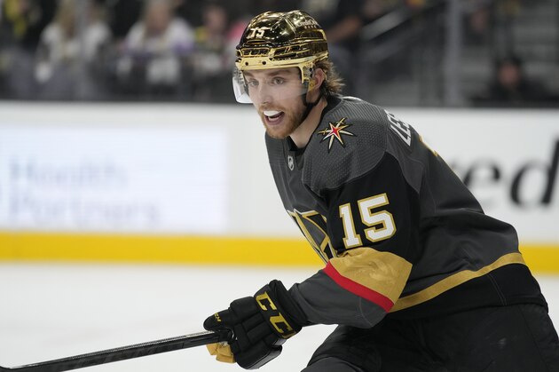 Vegas Golden Knights center Jake Leschyshyn (15) plays against the Vancouver Canucks during an NHL hockey game Wednesday, April 6, 2022, in Las Vegas. (AP Photo/John Locher)