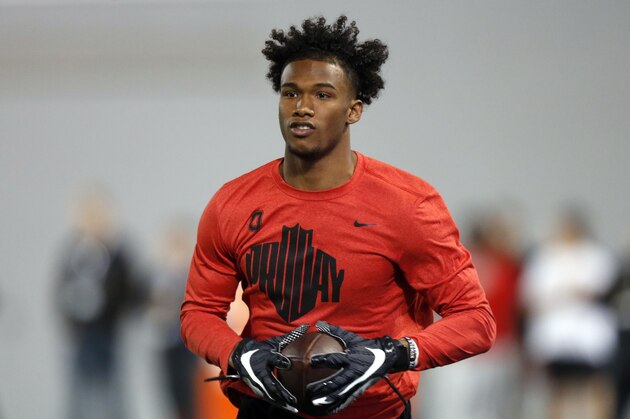 Wide receiver Garrett Wilson runs a football drill during Ohio State Pro Day in Columbus, Ohio, Wednesday, March 23, 2022. (AP Photo/Paul Vernon)