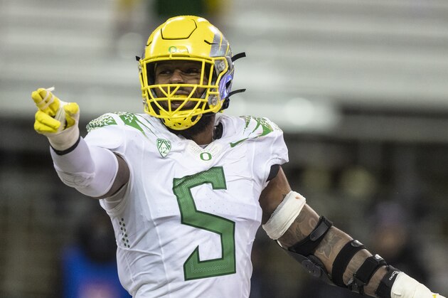 FILE - Oregon defensive end Kayvon Thibodeaux gestures during an NCAA college football game against Washington, Nov. 6, 2021, in Seattle. (AP Photo/Stephen Brashear, file)