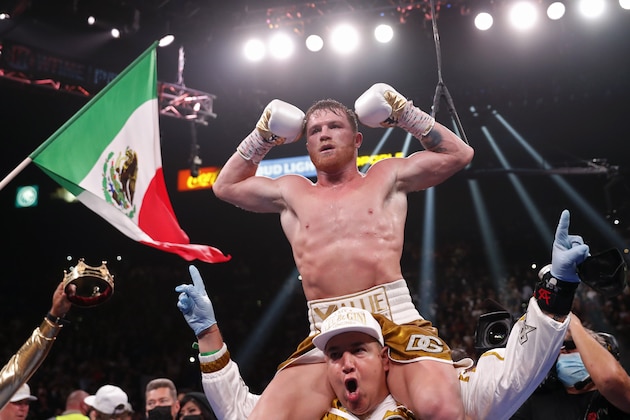 Canelo Alvarez, of Mexico, celebrates after defeating Caleb Plant by TKO in a super middleweight title unification fight Saturday, Nov. 6, 2021, in Las Vegas. (AP Photo/Steve Marcus)