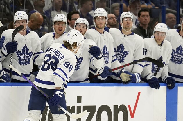 Toronto Maple Leafs right wing William Nylander (88) celebrates the bench after scoring against the Tampa Bay Lightning during the third period in Game 4 of an NHL hockey first-round playoff series Sunday, May 8, 2022, in Tampa, Fla. (AP Photo/Chris O'Meara)