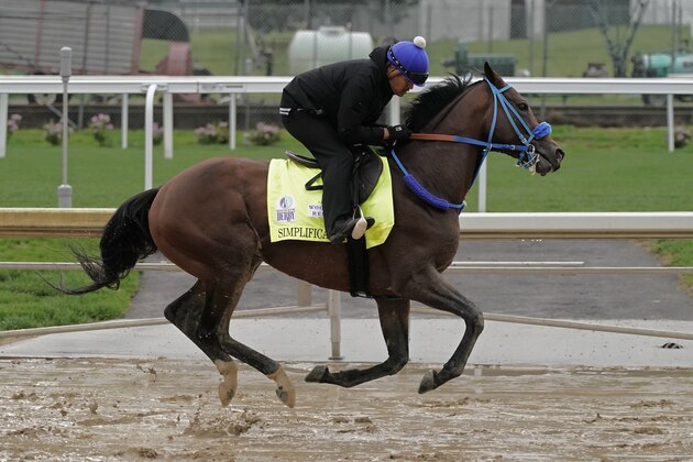Kentucky Derby entrant Simplification works out at Churchill Downs Tuesday, May 3, 2022, in Louisville, Ky. The 148th running of the Kentucky Derby is scheduled for Saturday, May 7. (AP Photo/Charlie Riedel)