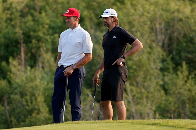 BIG SKY, MONTANA - JULY 06: Tom Brady (L) and Aaron Rodgers meet during Capital One's The Match at The Reserve at Moonlight Basin on July 06, 2021 in Big Sky, Montana. (Photo by Stacy Revere/Getty Images for The Match)