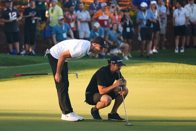 LAS VEGAS, NEVADA - JUNE 01: Tom Brady and Aaron Rodgers line up a putt during Capital One's The Match VI - Brady & Rodgers v Allen & Mahomes at Wynn Golf Club on June 01, 2022 in Las Vegas, Nevada. (Photo by Carmen Mandato/Getty Images for The Match)