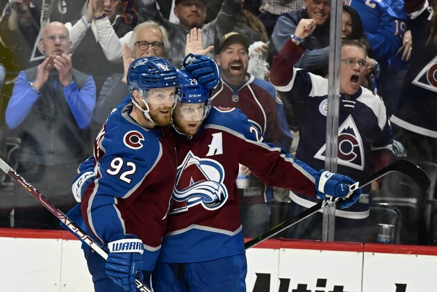 DENVER, CO - JUNE 02: Colorado Avalanche left wing Gabriel Landeskog (92) celebrates with teammate Colorado Avalanche center Nathan MacKinnon (29) after MacKinnon