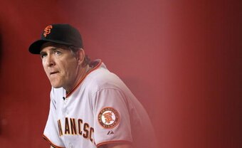 PHOENIX - SEPTEMBER 06:  Pitching coach Dave Righetti of the San Francisco Giants watches from the dugout during the Major League Baseball game against the Arizona Diamondbacks at Chase Field on September 6, 2010 in Phoenix, Arizona.  The Giants defeated 