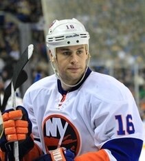 Feb 23, 2013; Buffalo, NY, USA; New York Islanders center Marty Reasoner (16) on the bench during the game against the Buffalo Sabres at the First Niagara Center. Islanders beat the Sabres 4-0. Mandatory Credit: Kevin Hoffman-USA TODAY Sports