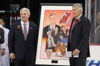 Mar 16, 2013; Newark, NJ, USA; New Jersey Devils owner Jeff Vanderbeek poses with former New Jersey Devils goalie coach Jacques Caron during the first at the Prudential Center. Mandatory Credit: Ed Mulholland-USA TODAY Sports