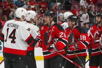 EAST RUTHERFORD, NJ - MAY 5:  Patrik Elias #26 of the New Jersey Devils shakes hands with Andrej Meszaros #14 of the Ottawa Senators after being eliminated in Game 5 of the 2007 Eastern Conference Semifinals on May 5, 2007 at Continental Airlines Arena in
