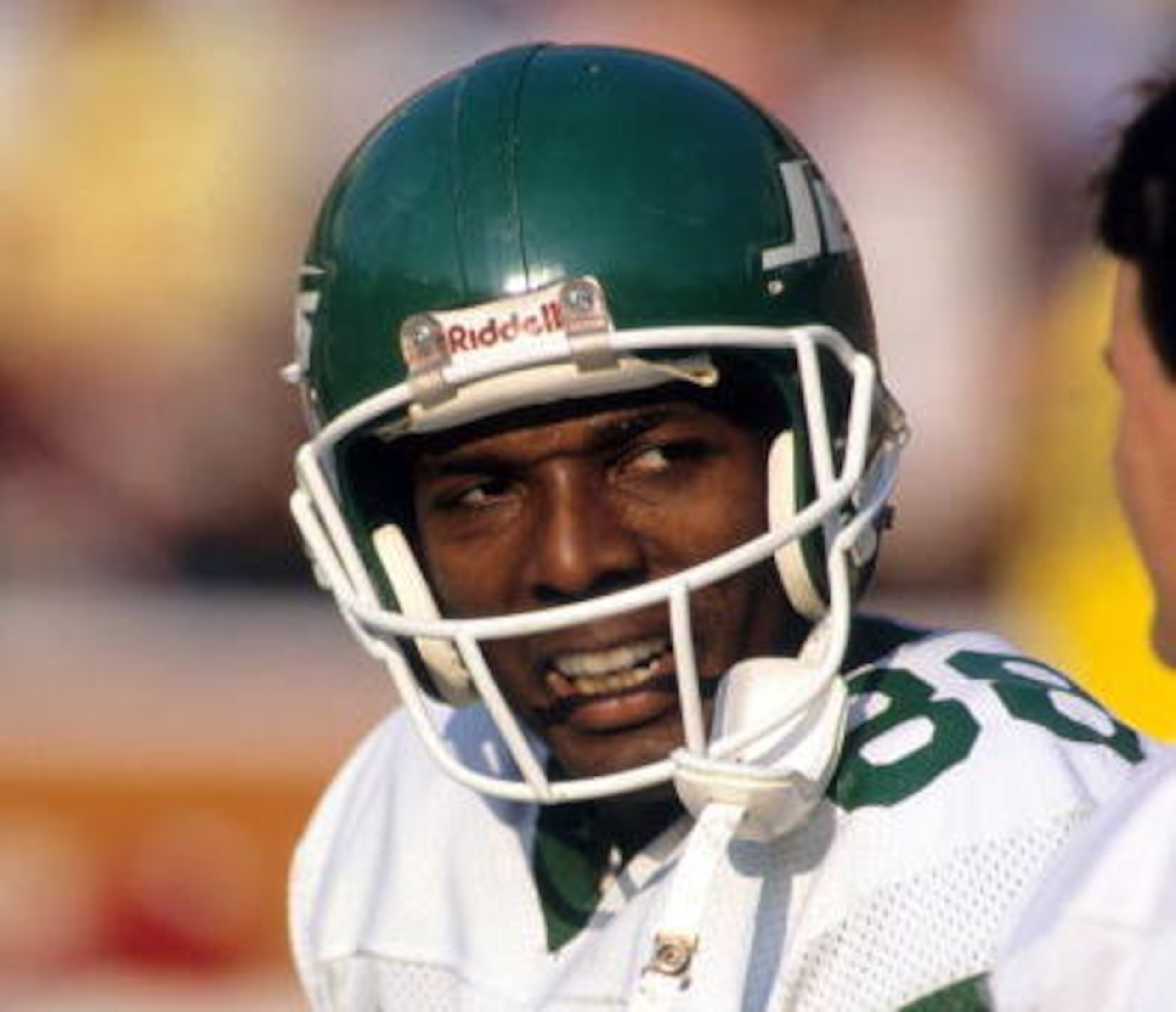 ANAHEIM, CA - DECEMBER 17:  Wide receiver Al Toon #88 of the New York Jets cracks a smile during a game against the Los Angeles Rams at Anaheim Stadium on December 17, 1989 in Anaheim, California.  The Rams won 38-14  (Photo by George Rose/Getty Images)