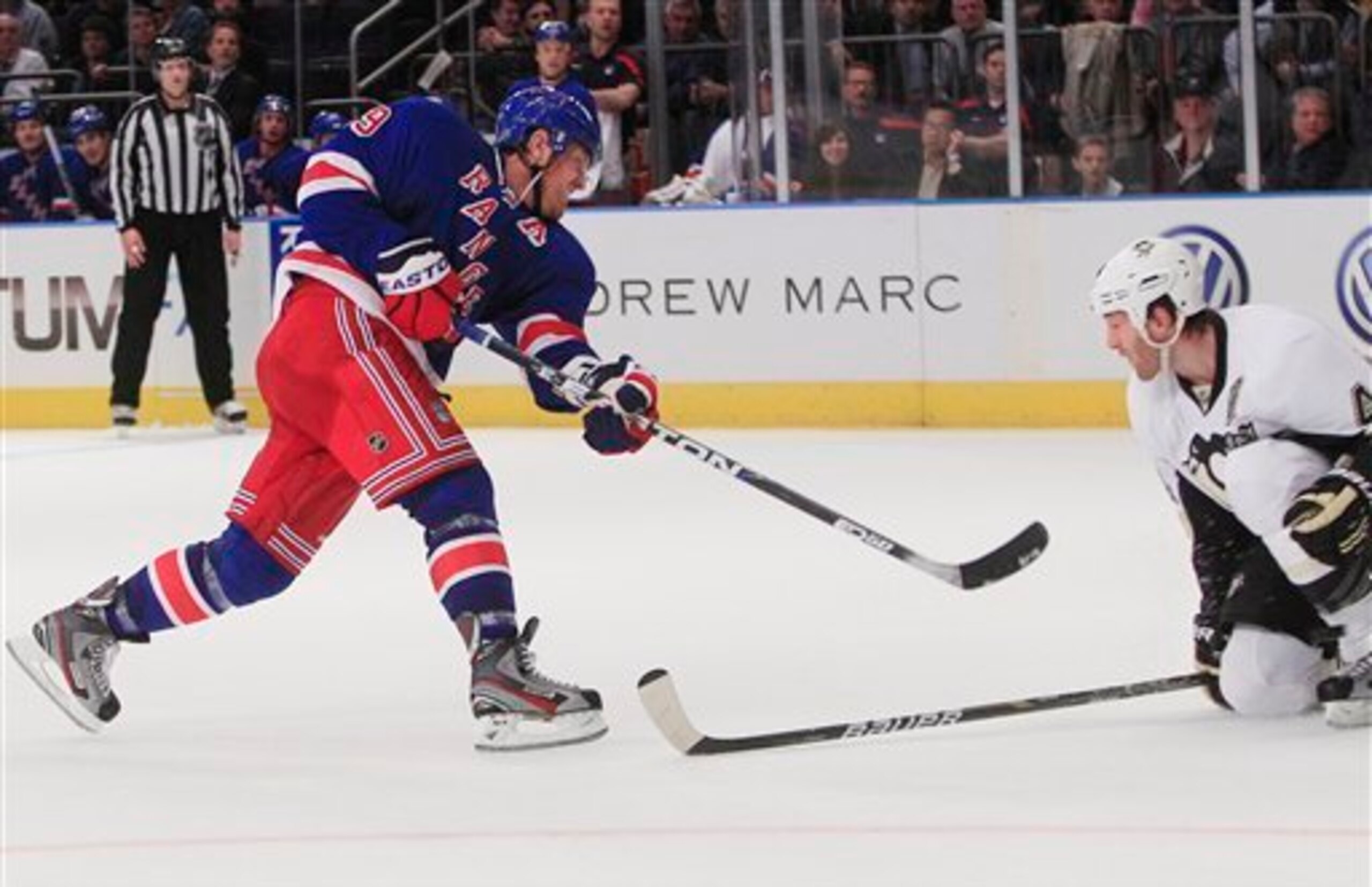 New York Rangers' Brad Richards follows through on a shot past Pittsburgh Penguins' Brooks Orpik (44) for a goal during the second period of an NHL hockey game Tuesday, Nov. 29, 2011, in New York.  (AP Photo/Frank Franklin II)