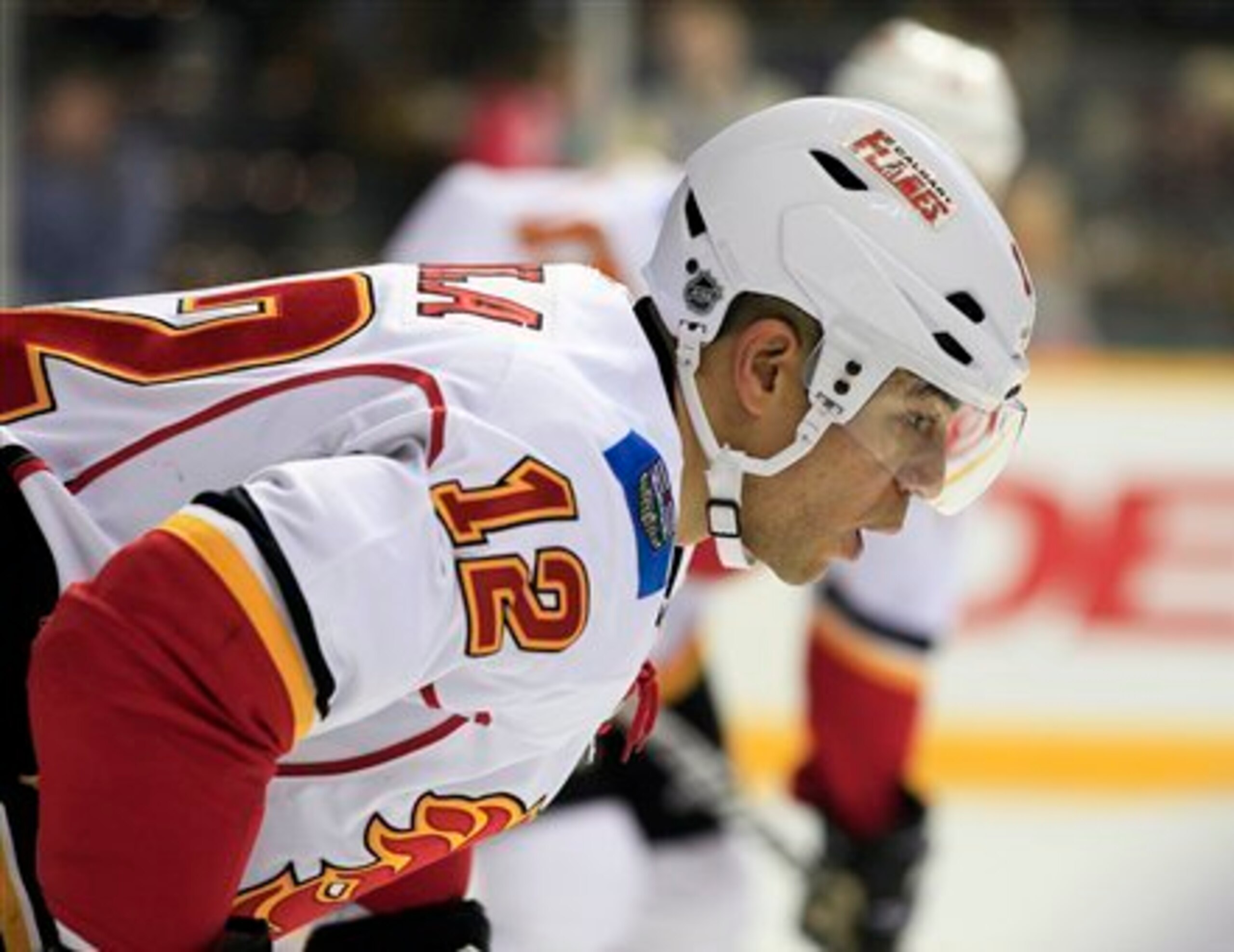 Calgary Flames right wing Jarome Iginla (12) waits for a face-off against the Nashville Predators in the second period of an NHL hockey game on Tuesday, Dec. 13, 2011, in Nashville, Tenn. (AP Photo/Mark Humphrey)