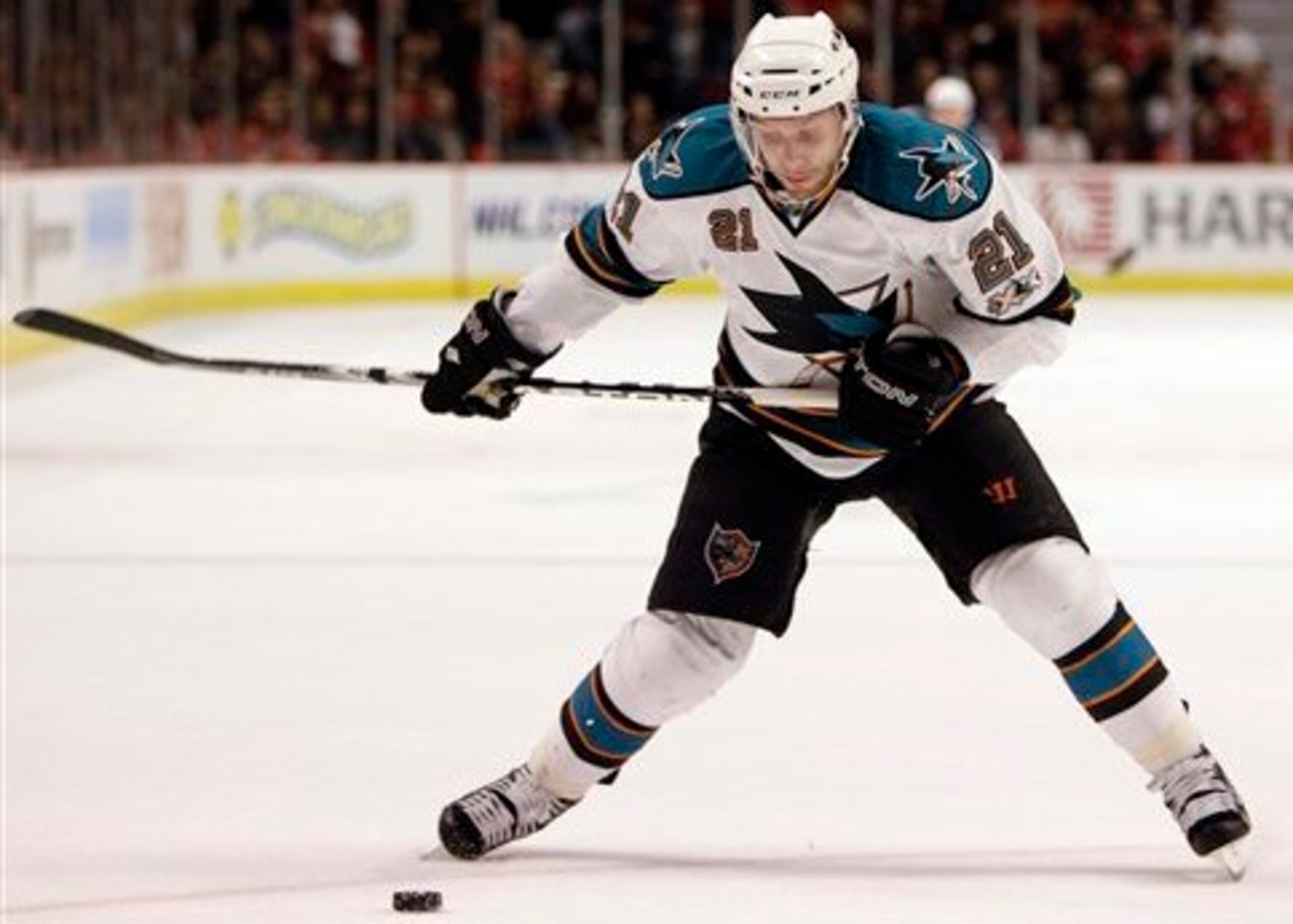 San Jose Sharks' Scott Nichol shoots against the Chicago Blackhawks during the first period of an NHL hockey game in Chicago, Thursday, Dec. 30, 2010. (AP Photo/Nam Y. Huh)