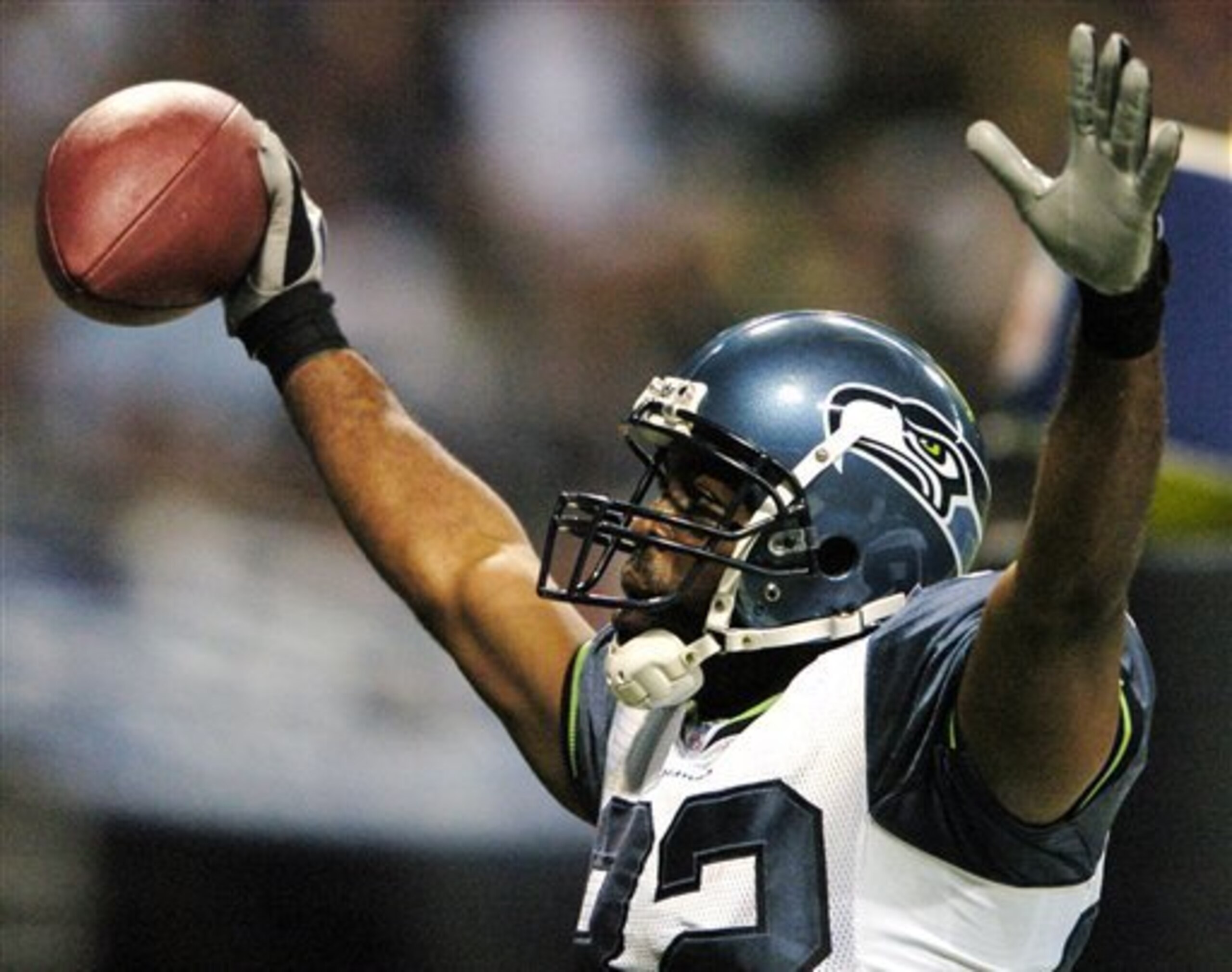 Seattle Seahawks Darrell Jackson celebrates his third quarter 42 yard pass from Matt Hasselbeck against the St. Louis Rams during their football game Sunday, Oct. 15, 2006, at the Edward Jones Dome in St. Louis. The Seahawks beat the Rams 30-28. (AP Photo Seattle Seahawks Darrell Jackson celebrates his third quarter 42 yard pass from Matt Hasselbeck against the St. Louis Rams during their football game Sunday, Oct. 15, 2006, at the Edward Jones Dome in St. Louis. The Seahawks beat the Rams 30-28. (AP Photo