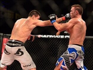 Oct 9, 2013; Barueri, Sao Paulo, Brazil; Demian Maia (red gloves) fights against Jake Shields (blue gloves) during UFC Fight Night 29 at Jose Correa Arena. Mandatory Credit: Jason Silva-USA TODAY Sports