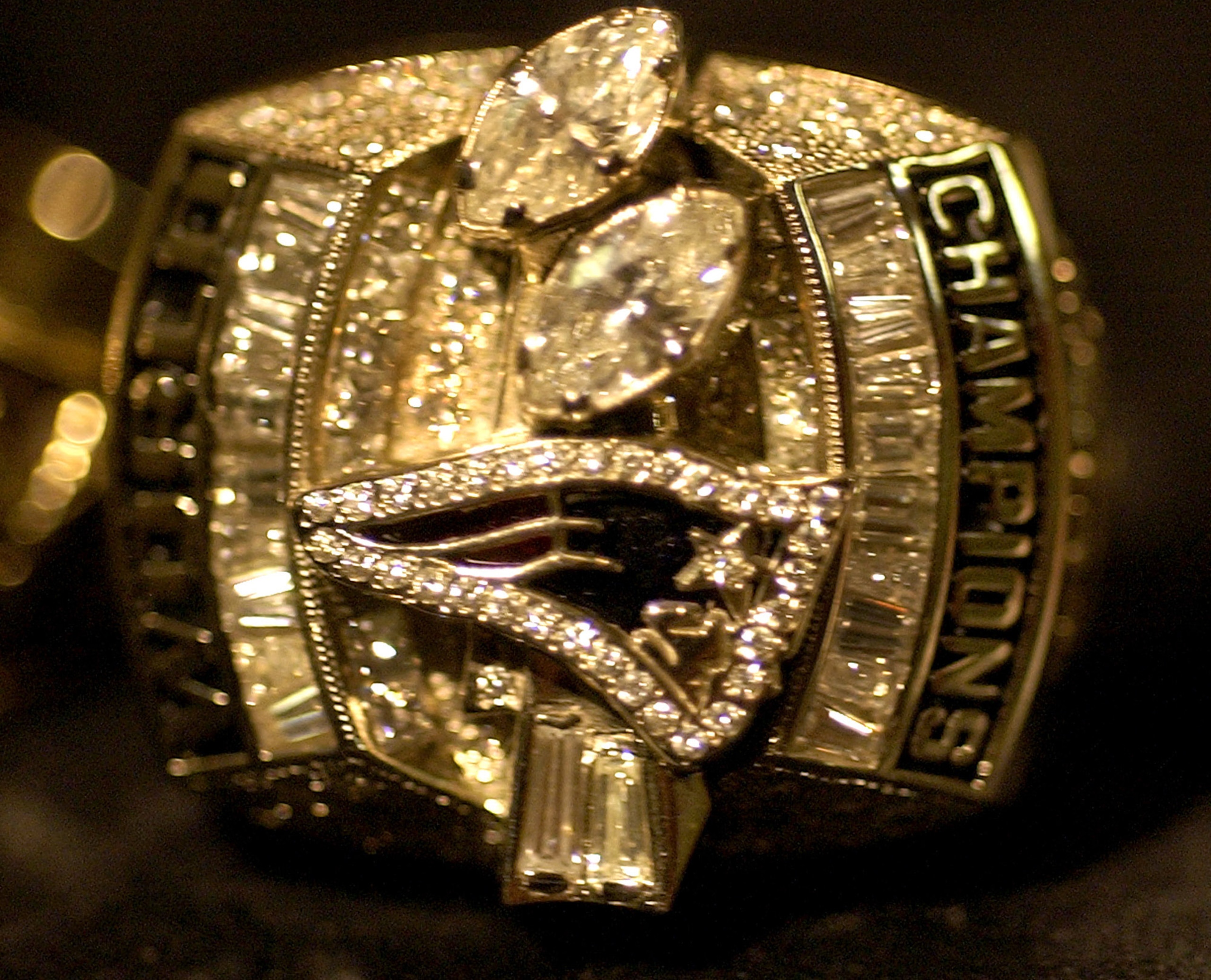 The New England Patriots Super Bowl XXXVIII championship rings, like the one shown in this photo, were distributed to players at a ceremony at the home of owner Robert Kraft in Brookline, Mass., Sunday, June 13, 2004. (AP Photo/Adam Hunger) The New England Patriots Super Bowl XXXVIII championship rings, like the one shown in this photo, were distributed to players at a ceremony at the home of owner Robert Kraft in Brookline, Mass., Sunday, June 13, 2004. (AP Photo/Adam Hunger)