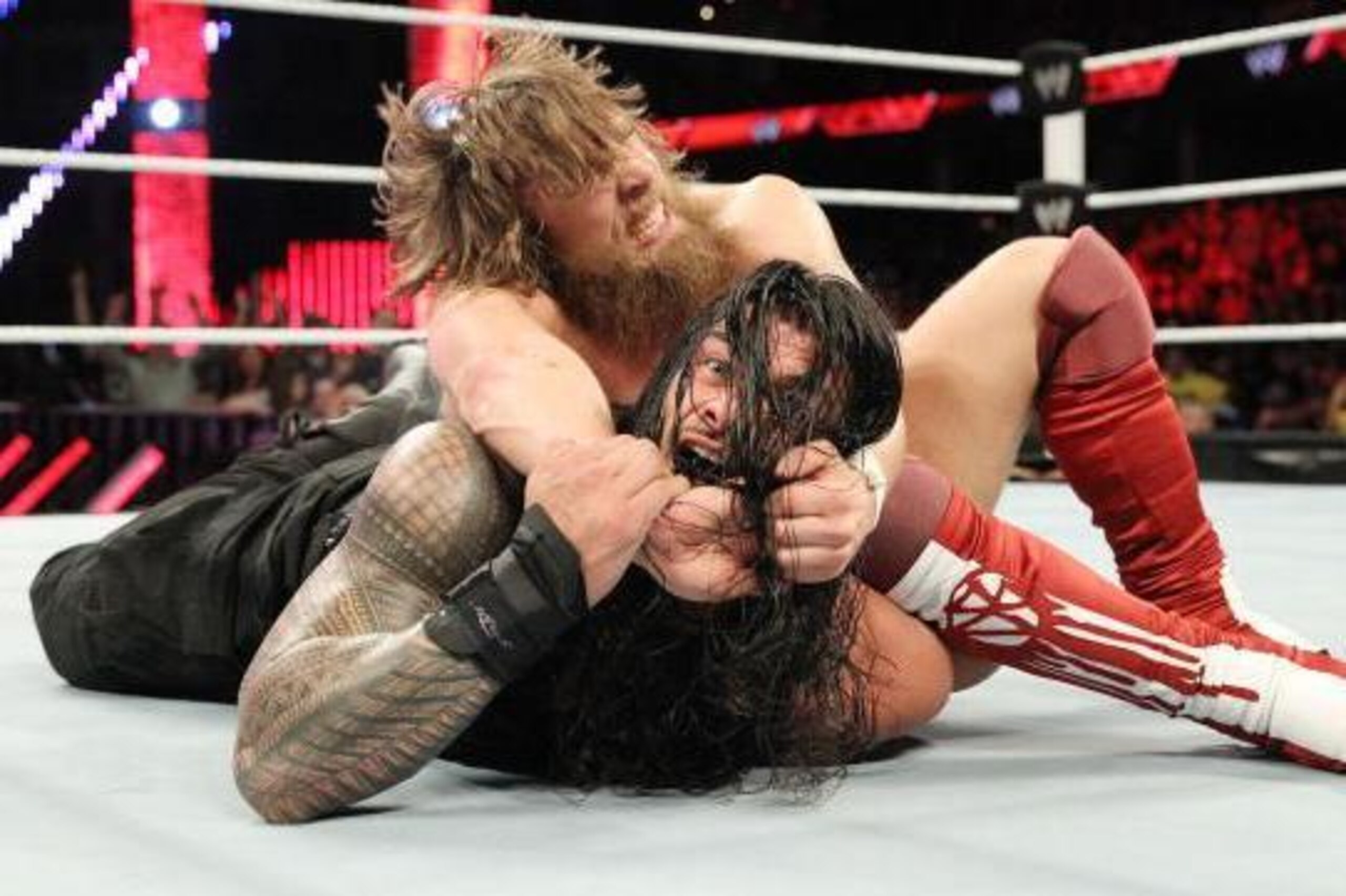 Daniel Bryan secures the Yes! Lock on Roman Reigns. (Courtesy of WWE.com)