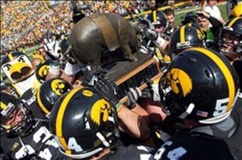 September 29, 2012; Iowa City, IA, USA; The Iowa Hawkeyes win the battle for the Floyd of Rosedale trophy against the Minnesota Golden Gophers at Kinnick Stadium. The Hawkeyes beat the Gophers 31-13. Mandatory Credit: Reese Strickland-USA TODAY Sports September 29, 2012; Iowa City, IA, USA; The Iowa Hawkeyes win the battle for the Floyd of Rosedale trophy against the Minnesota Golden Gophers at Kinnick Stadium. The Hawkeyes beat the Gophers 31-13. Mandatory Credit: Reese Strickland-USA TODAY Sports