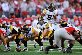 COLUMBUS, OH - NOVEMBER 14: Quarterback James Vandenberg #16 of the Iowa Hawkeyes takes the snap from center against the Ohio State Buckeyes at Ohio Stadium on November 14, 2009 in Columbus, Ohio. (Photo by Jamie Sabau/Getty Images) COLUMBUS, OH - NOVEMBER 14: Quarterback James Vandenberg #16 of the Iowa Hawkeyes takes the snap from center against the Ohio State Buckeyes at Ohio Stadium on November 14, 2009 in Columbus, Ohio. (Photo by Jamie Sabau/Getty Images)