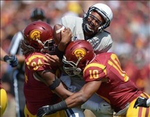 Keeton getting crunched by Pullard and Williams.