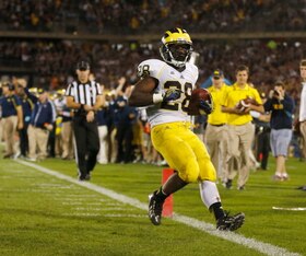 Fitz Toussaint had his breakout game of 2013 with 120 yards and two TDs.