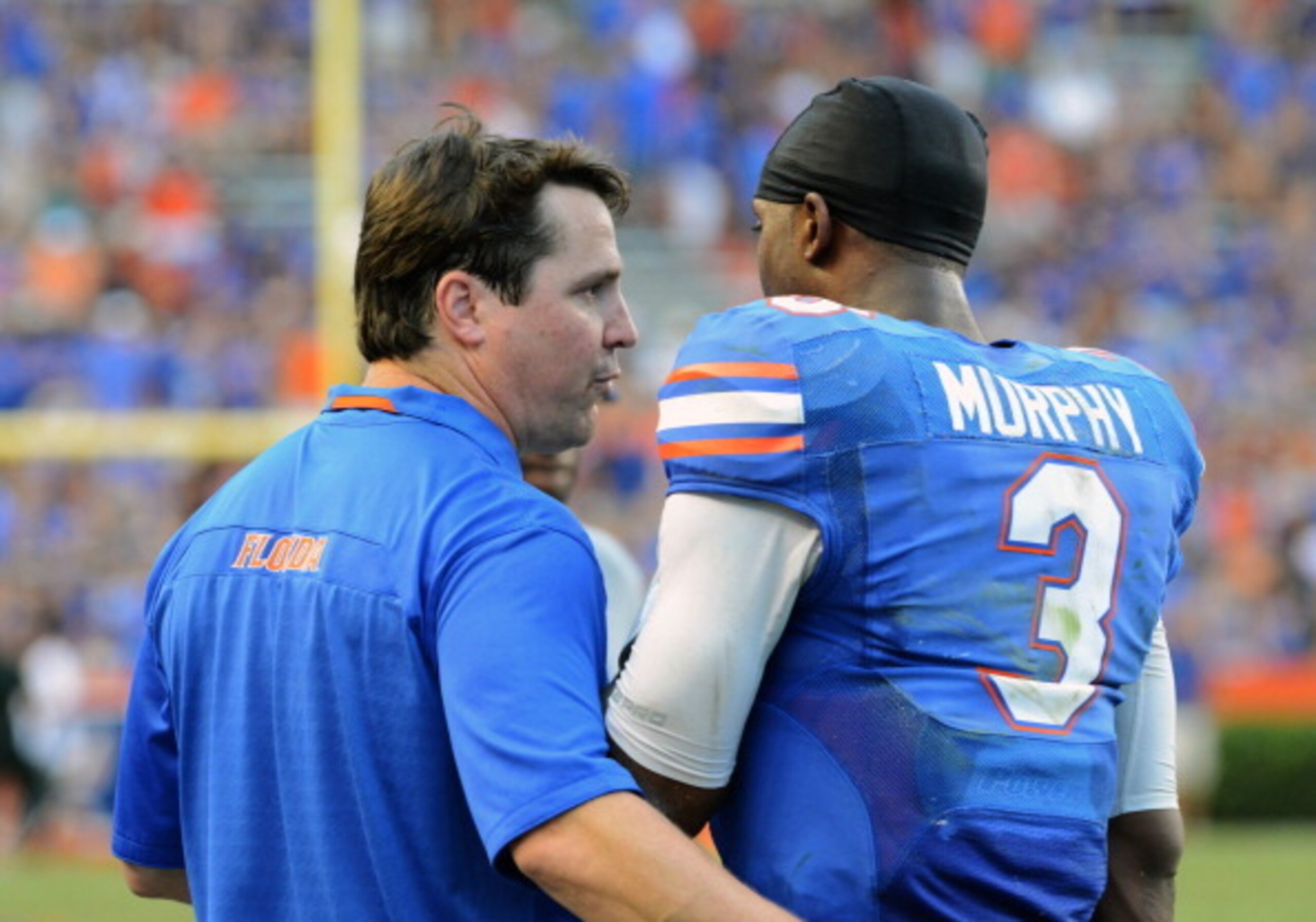 Coach Will Muschamp and QB Tyler Murphy