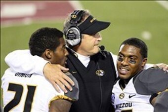 Gary Pinkel celebrates with players after a Missouri win at Indiana this past weekend.