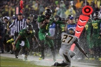 Josh Huff eluding a defender.