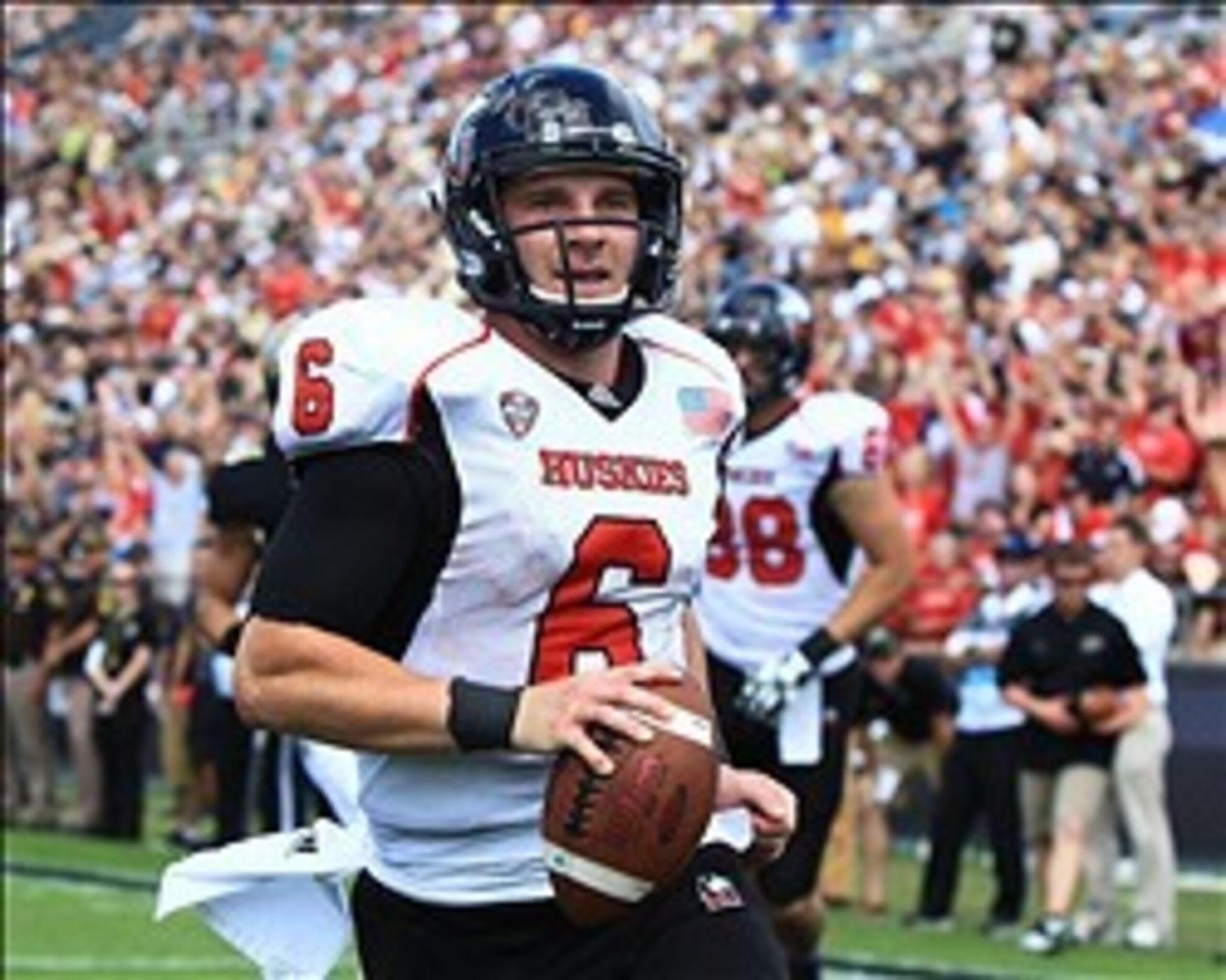 Sep 28, 2013; West Lafayette, IN, USA;  Northern Illinois Huskies quarterback Jordan Lynch (6) runs for a touchdown against the Purdue Boilermakers at Ross Ade Stadium. Northern Illinois won 55-24. Mandatory Credit: Pat Lovell-USA TODAY Sports