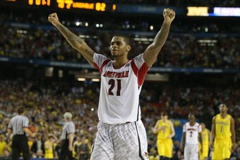 Chane Behanan celebrates the national title after dominating the paint against Michigan.