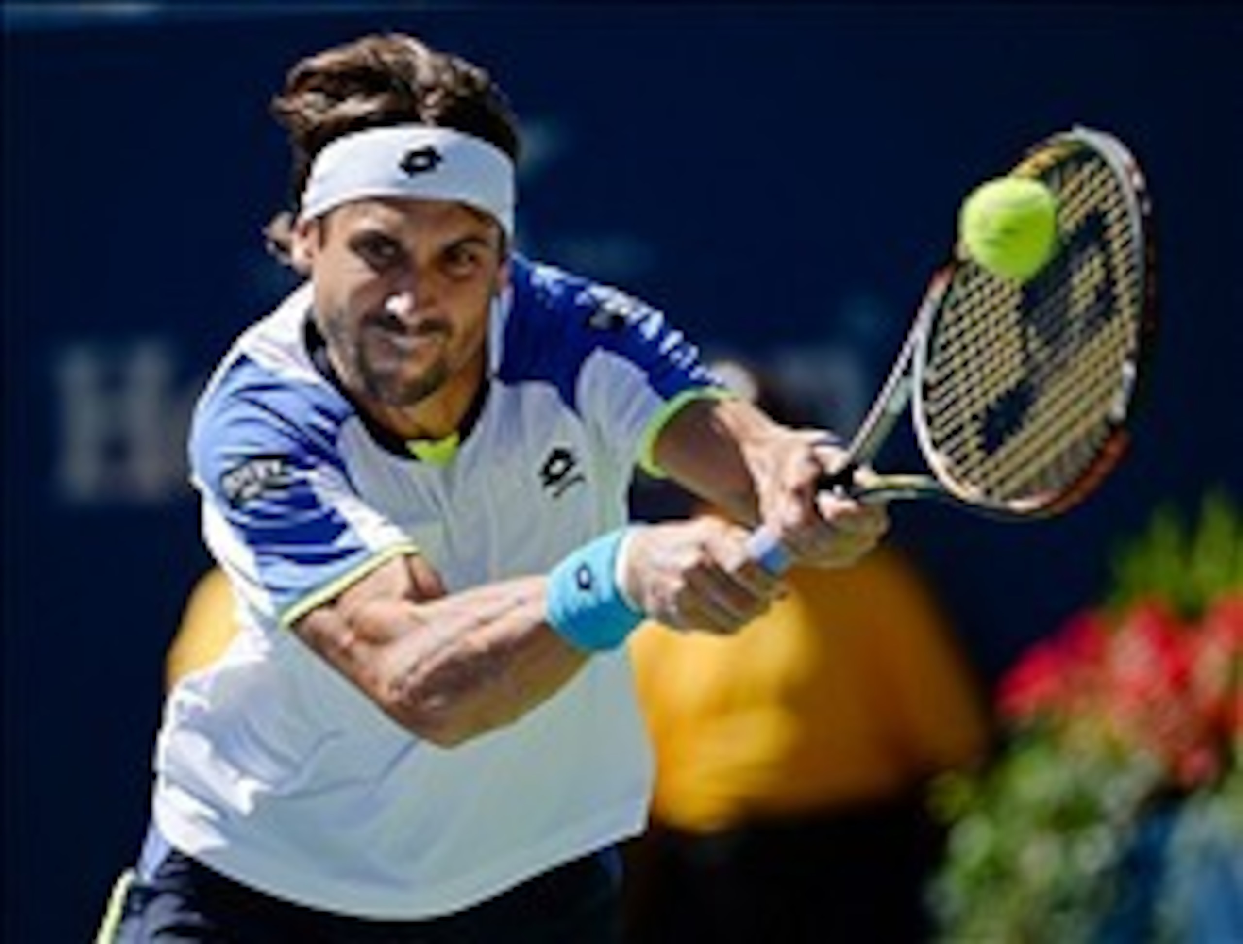 David Ferrer tries to bend his Prince EXO3 Tour 100 around a ball at the 2013 U.S. Open.