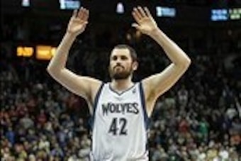 Dec 29, 2012; Minneapolis, MN, USA; Minnesota Timberwolves forward Kevin Love (42) celebrates a play during the fourth quarter against the Phoenix Suns at the Target Center. The Timberwolves defeated the Suns 111-107. Mandatory Credit: Brace Hemmelgarn-US