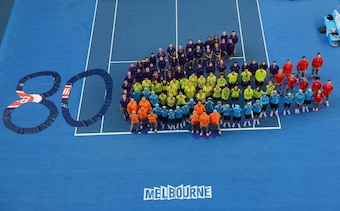 Ball boys and girls gather to form the Lacoste logo at the Australian Open.