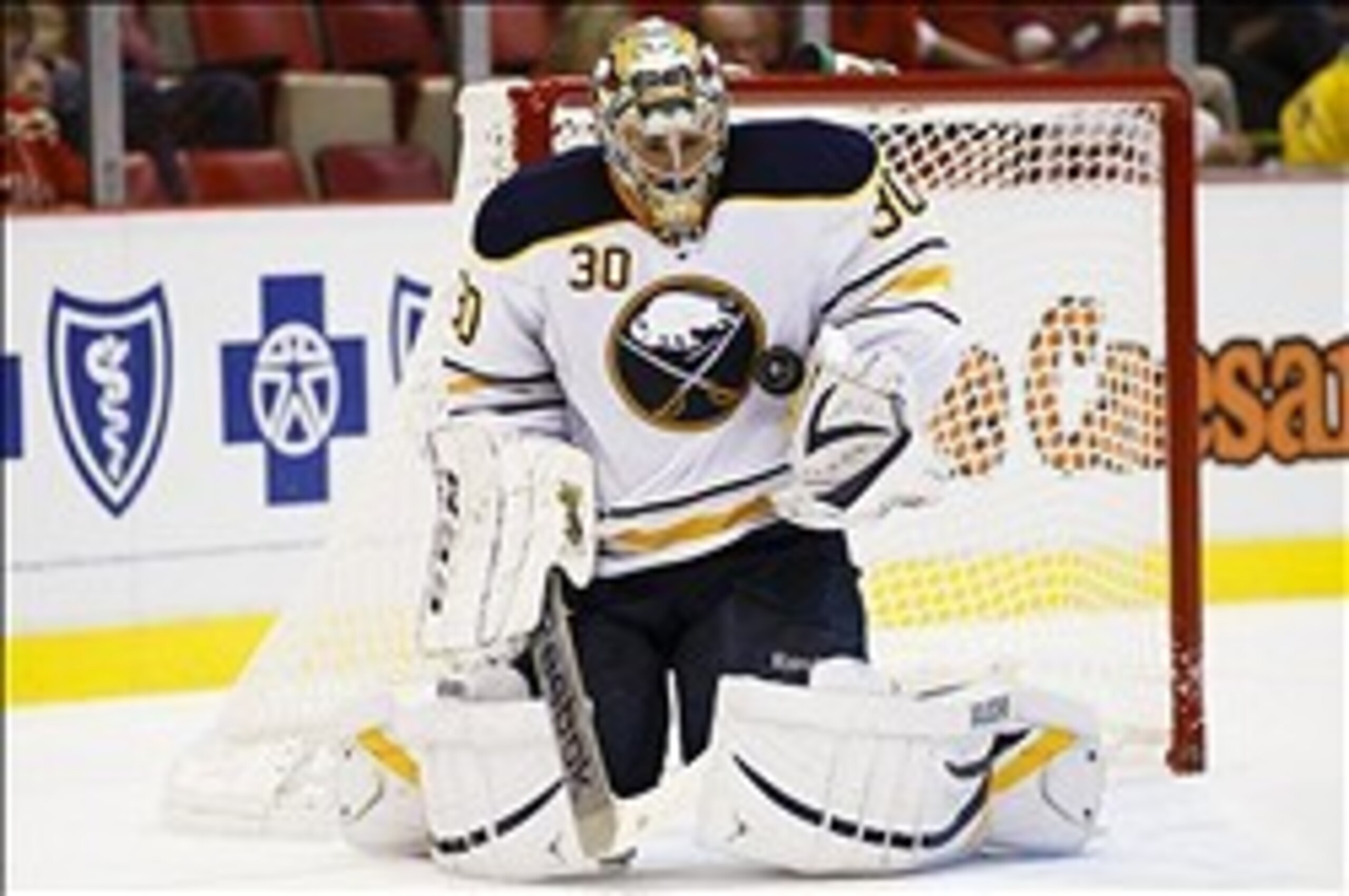 Oct 2, 2013; Detroit, MI, USA; Buffalo Sabres goalie Ryan Miller (30) makes a save in the third period against the Detroit Red Wings at Joe Louis Arena. Detroit won 2-1. Mandatory Credit: Rick Osentoski-USA TODAY Sports Oct 2, 2013; Detroit, MI, USA; Buffalo Sabres goalie Ryan Miller (30) makes a save in the third period against the Detroit Red Wings at Joe Louis Arena. Detroit won 2-1. Mandatory Credit: Rick Osentoski-USA TODAY Sports