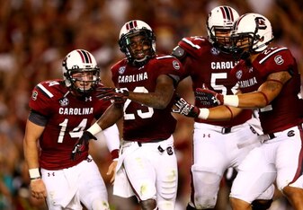 The Gamecocks should be celebrating a victory against Tennessee if Connor Shaw (14) has another big game.